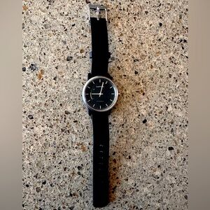 Black Garmin watch. Slightly used. Great condition.